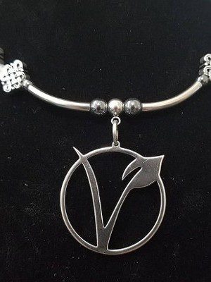 V-shaped with a ring pendant